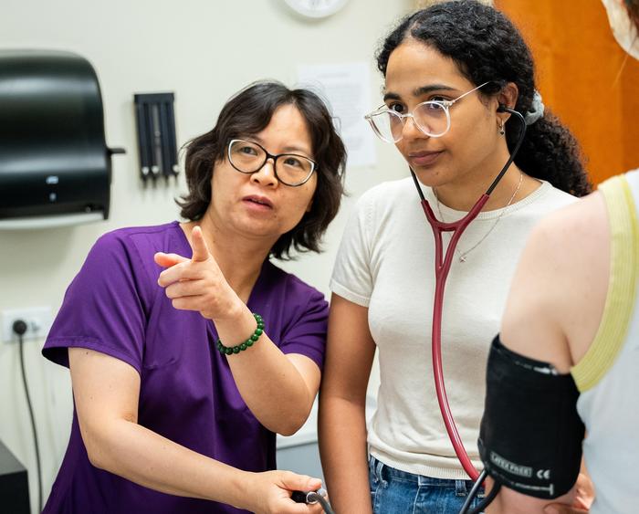 student taking blood pressure