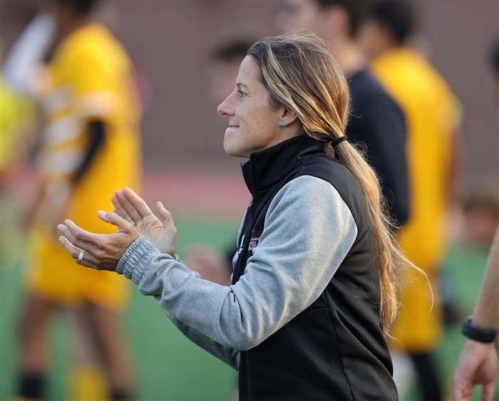 Julianne Sitch cheering on soccer field