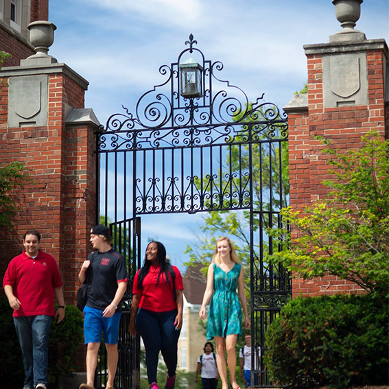 students walking together through the gates at harlan and blackstone halls