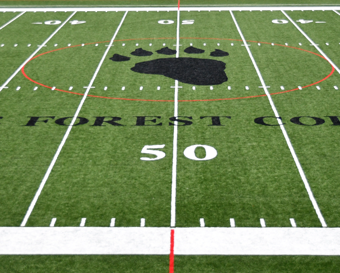 Football field with Forester logo at centerfield