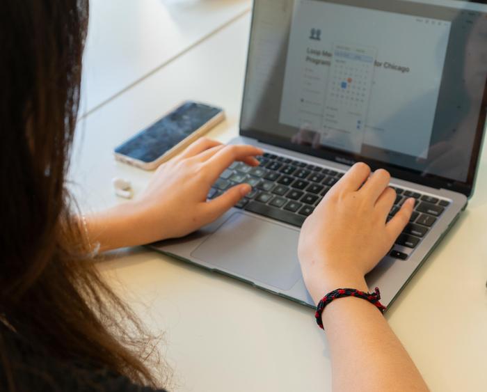 someone working on a laptop computer