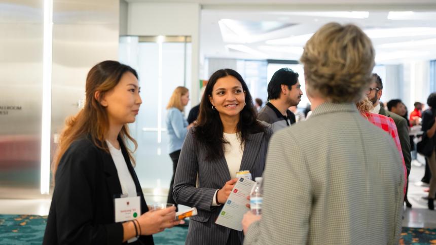 aarti speaks with someone at the loop mixer