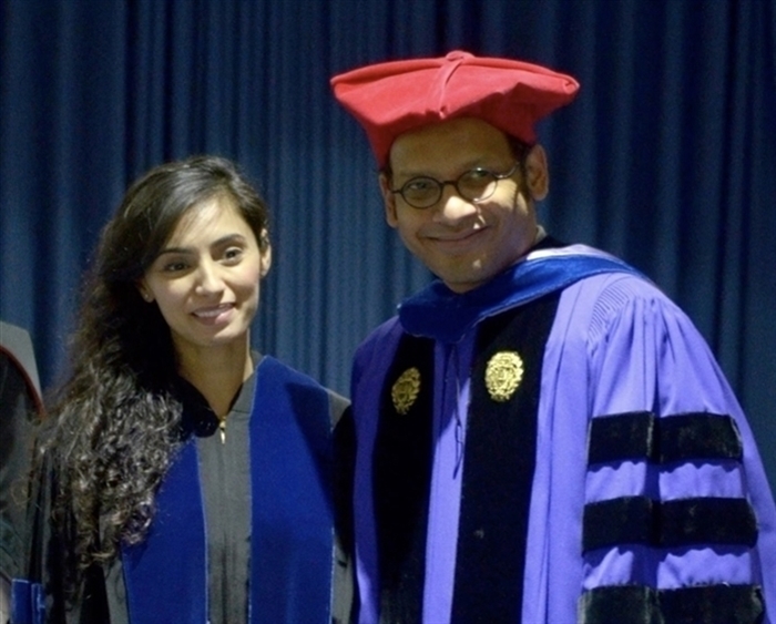 Nijee Luthra and Shubhik DebBurman in graduation robes