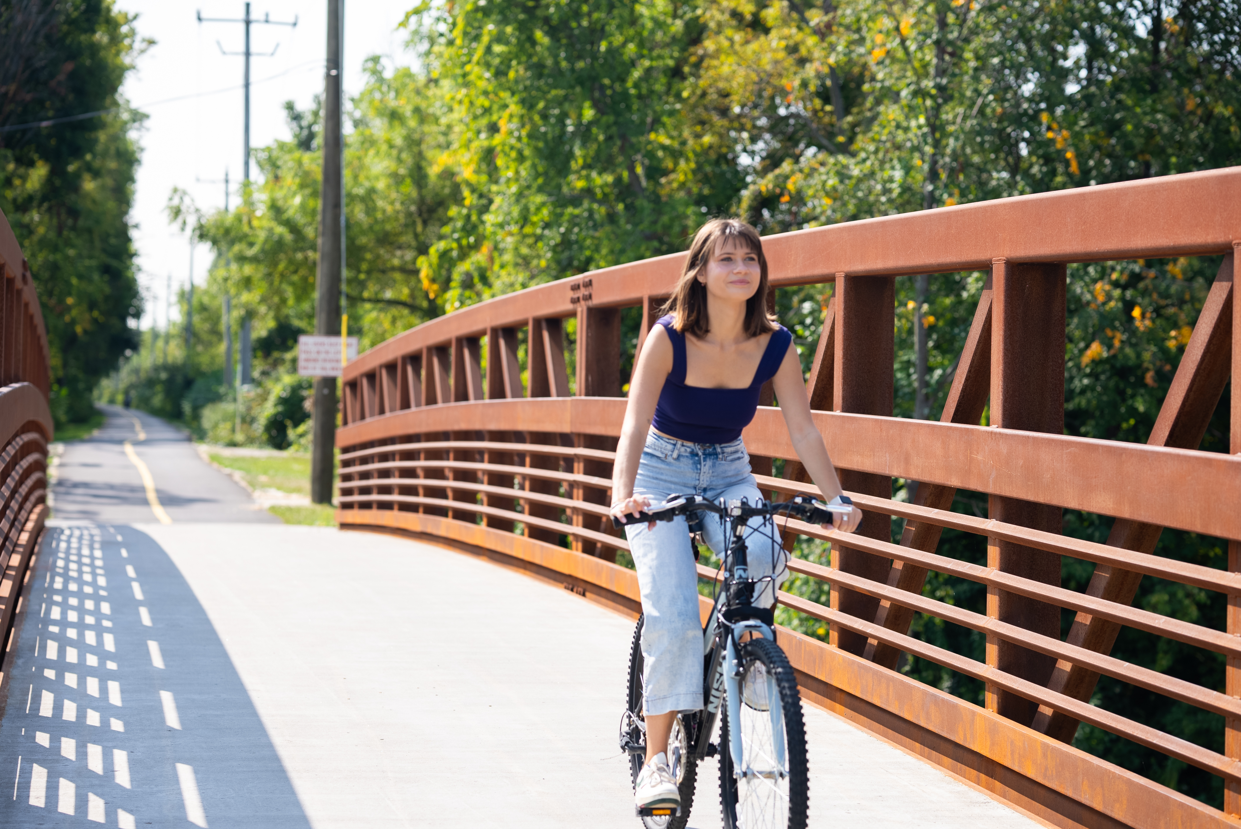 student riding bike