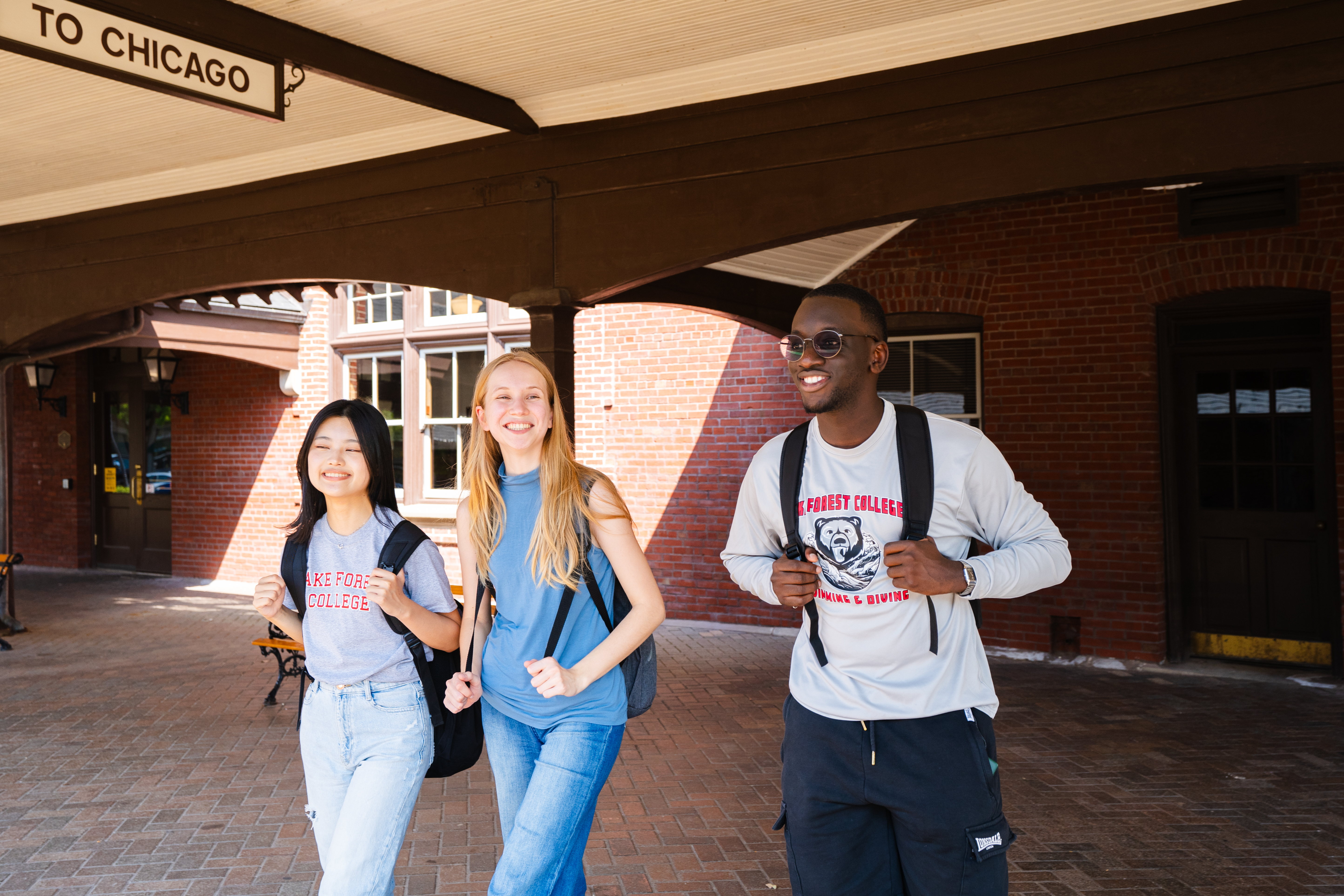 students waiting for train