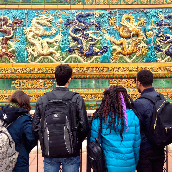 Students looking at a Chinese monument