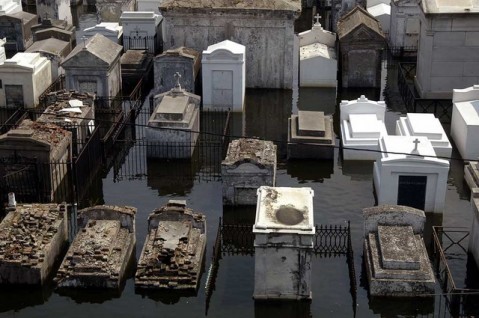 New Orleans, LA 9/5/05 -- A cemetery is swamped with floodwaters from hurricane Katrina. The cemeteries are above ground here due to the high water table. Photo by: Liz Roll