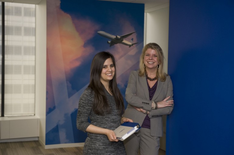 Student Shivani Jethwa (left) with her supervisor during her internship at United Airlines. 